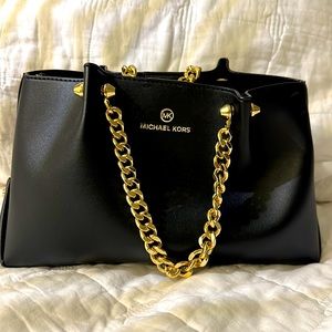 Black and Gold Brand New Michael Kors Purse.  Perfect for Wrist!